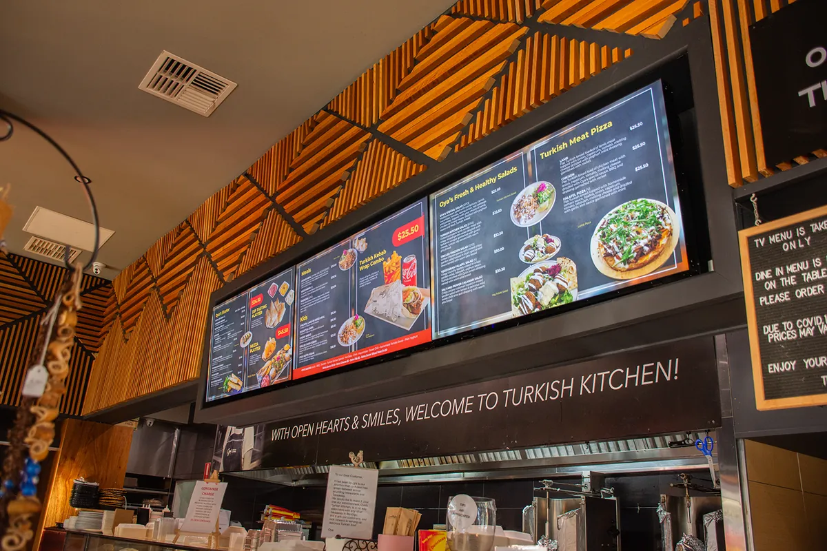 Close-up of digital menu boards at a Turkish kitchen